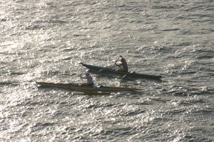 Canoe paddlers in Kalapaki bay